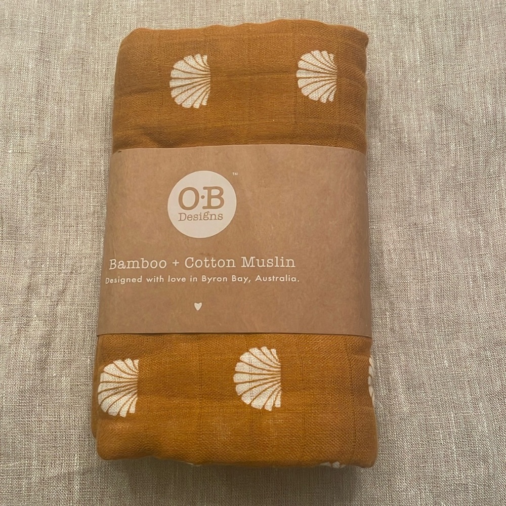 Super soft, bamboo + cotton muslin baby swaddle, blanket, changing pad, nursing.